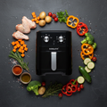 Flat lay freidora aire con alimentos